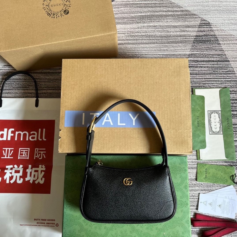 G*u*i top handle bags